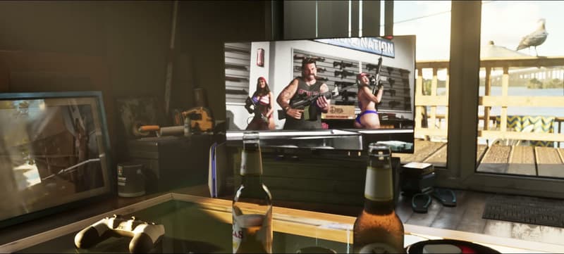 The Phil’s Ammunation advert playing on a living-room TV beside a games console