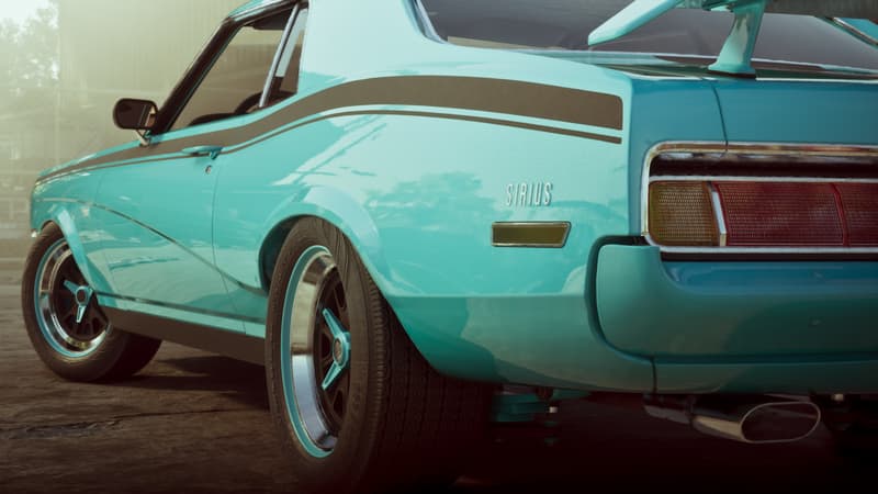 The rear quarter of a turquoise muscle car carrying a chrome Sirius badge above the tail light.